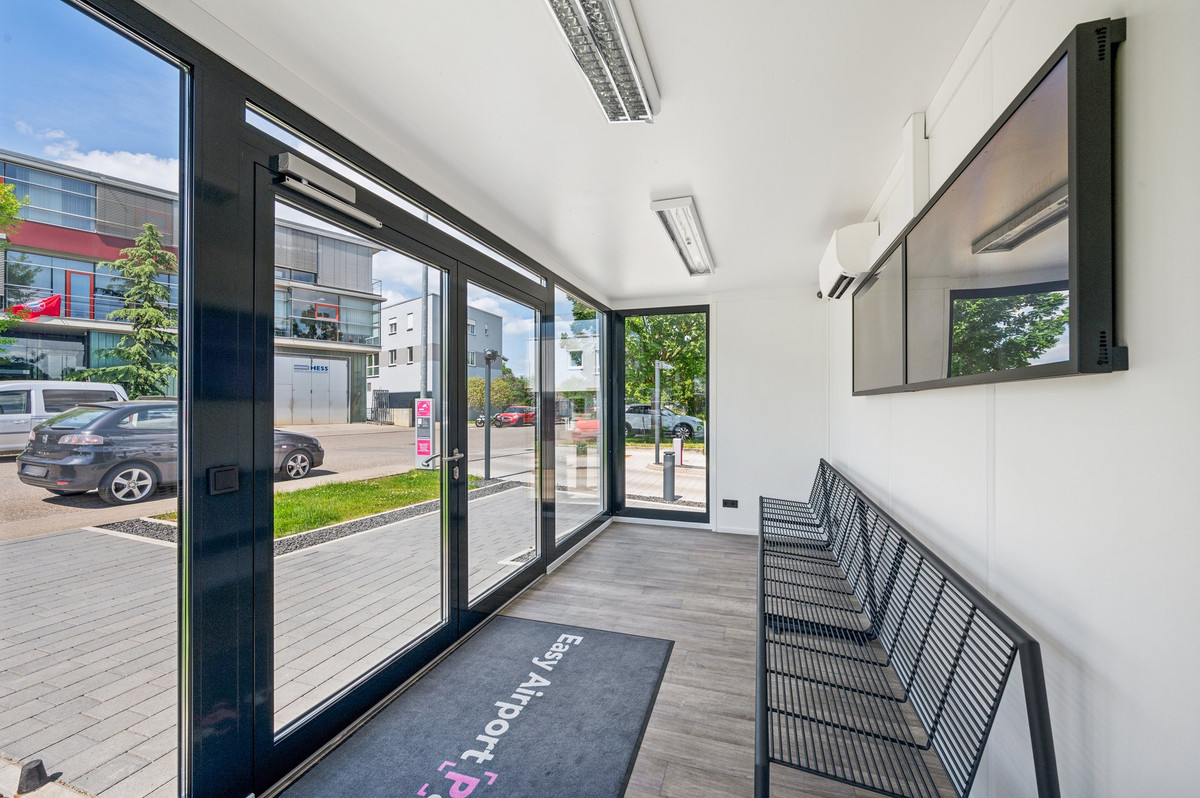 Interior view of the modern shelter with seating at the parking lot of Easy Airport Parking at Stuttgart Airport (STR)